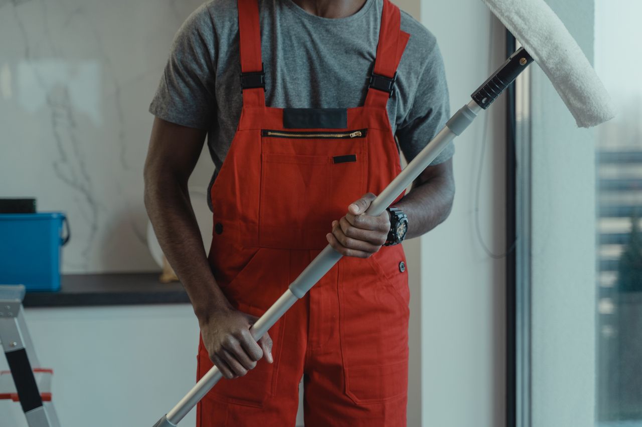 Professional cleaner maintaining a clean and hygienic workplace